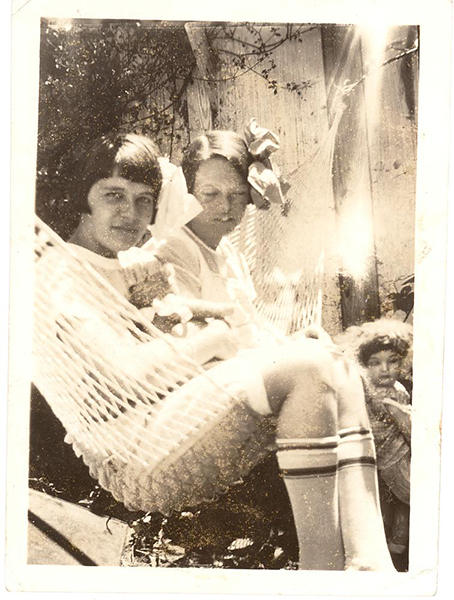 Snapshot of Two Young Women on a Hammock